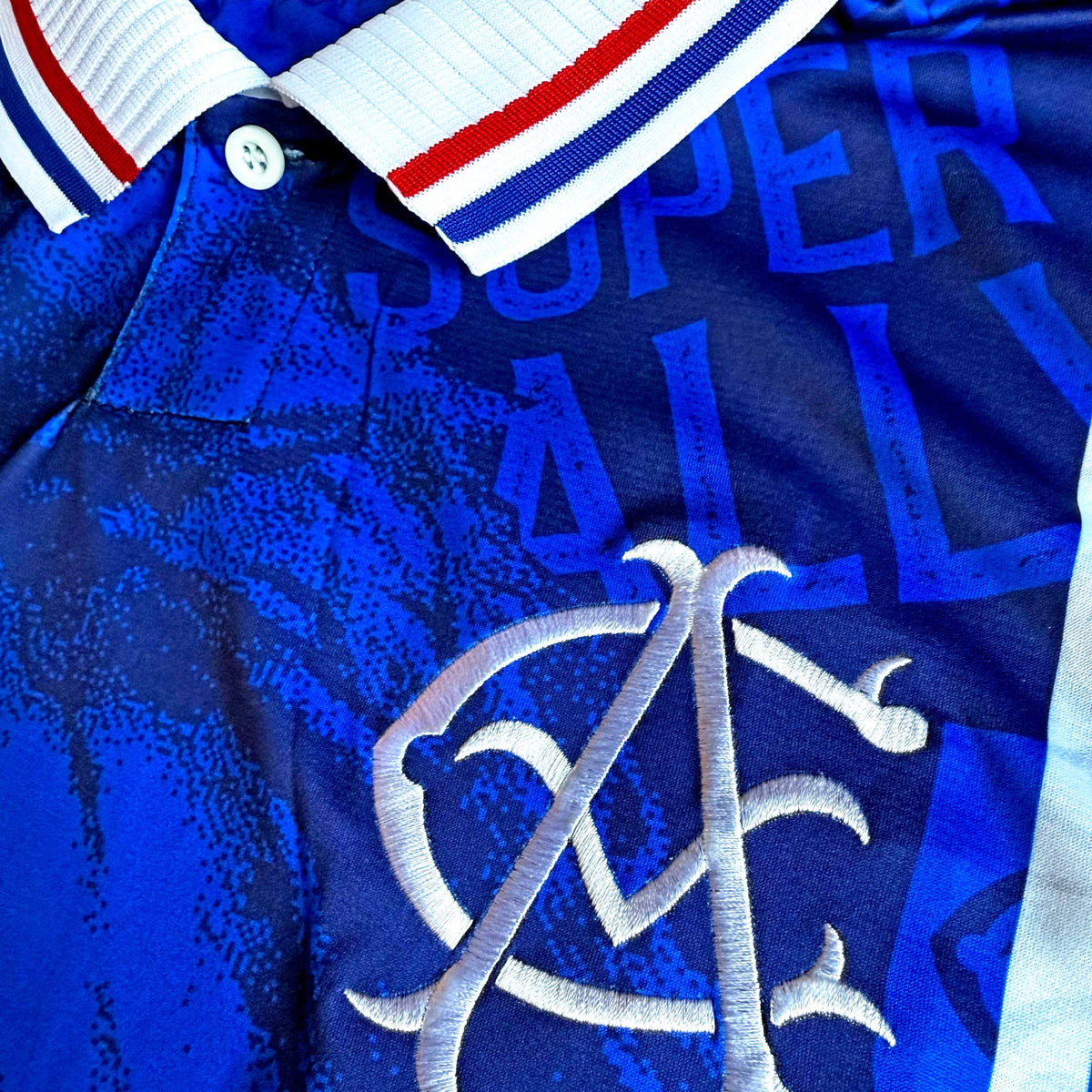 Super Ally Football Jersey Royal Blue woven crest detail McCoist inspired retro style oversize ft performance fabric available 2 asphaltsocialklub.com 